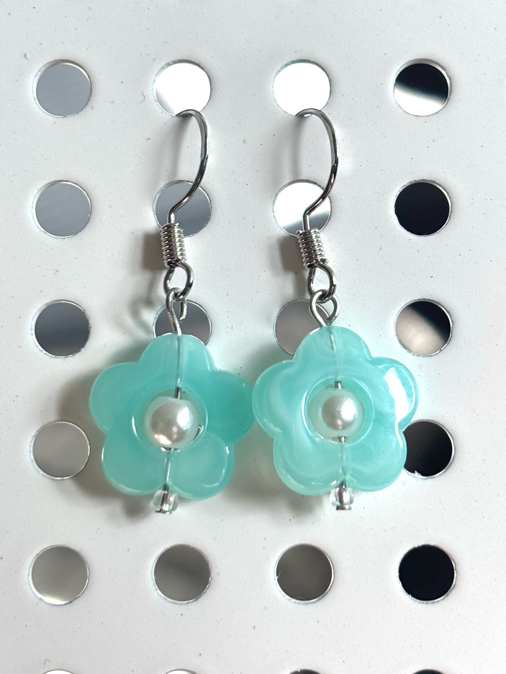 Sterling silver flower dangly earrings